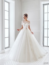 Bridal Dress: Sans Pareil Bridal Collection 2016: 906 - Amazing tulle ball gown with illusion lace off-the-shoulder half-sleeves and flower encrusted waistband  